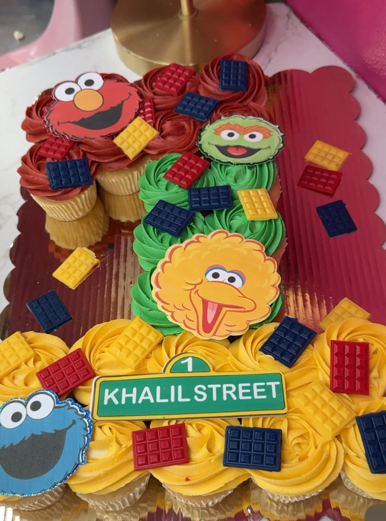 Sesame Street number-one cupcake cake with Elmo, Big Bird and Cookie Monster toppers